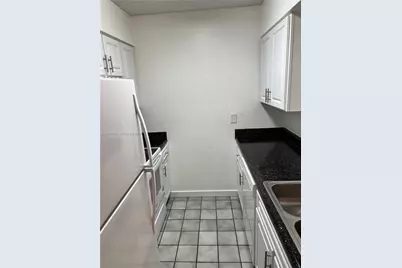 2831 N Oakland Forest Dr #210, Oakland Park, FL 33309 - Photo 5