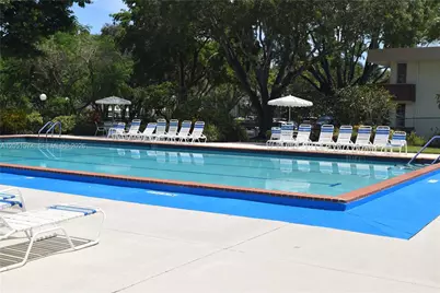 3970 Oaks Clubhouse Dr #306, Pompano Beach, FL 33069 - Photo 21