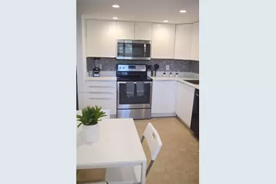 3970 Oaks Clubhouse Dr #306, Pompano Beach, FL 33069 - Photo 1