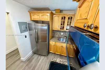 1945 NW 29th St #A8, Miami, FL 33142 - Photo 5