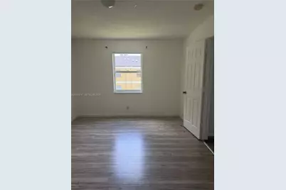 2451 NW 56th Ave #1-205, Lauderhill, FL 33313 - Photo 1