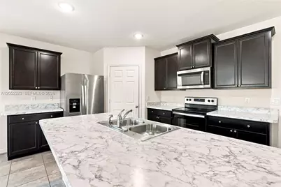 4650 SW Babylon St, Port Saint Lucie, FL 34953 - Photo 7