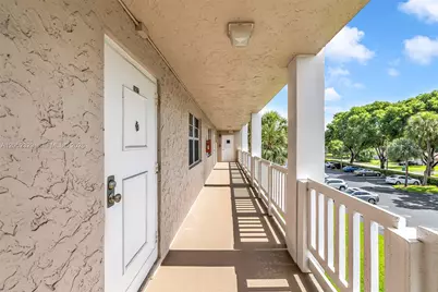 1100 NW 87th Ave #307, Coral Springs, FL 33071 - Photo 5