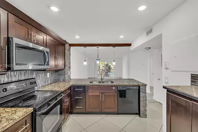 1100 NW 87th Ave #307, Coral Springs, FL 33071 - Photo 1