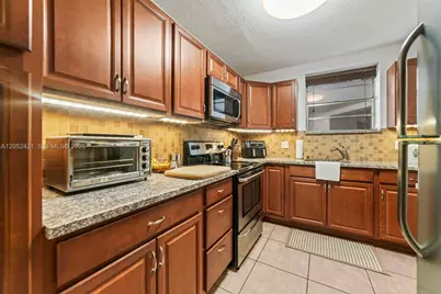 1400 Tallwood Ave #107, Hollywood, FL 33021 - Photo 7