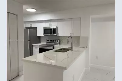 720 SW 111th Ave #101, Pembroke Pines, FL 33025 - Photo 1