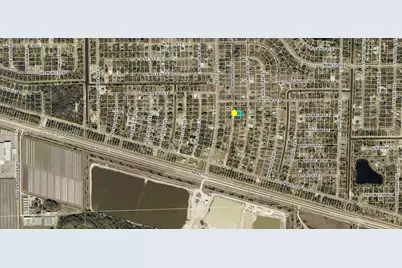 1061 S Portland Ave., Lehigh Acres, FL 33974 - Photo 3