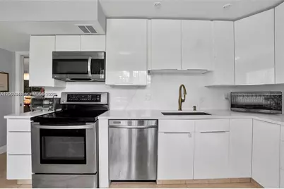 3970 Oaks Clubhouse Dr #302, Pompano Beach, FL 33069 - Photo 13