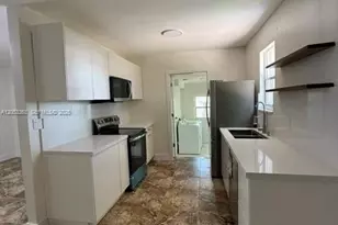1121 NW 56th St, Miami, FL 33127 - Photo 9