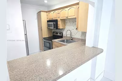 6070 W 18th Ave #213, Hialeah, FL 33012 - Photo 3