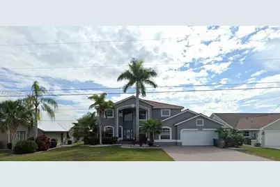 706 SW 56th Street, Cape Coral, FL 33914 - Photo 1