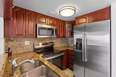 8585 NW 6th Ln #9-208, Miami, FL 33126 - Photo 9