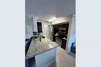 3830 Lyons Rd #203-3, Coconut Creek, FL 33073 - Photo 5
