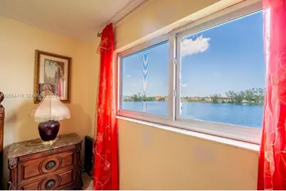 9917 W Okeechobee Rd #3-306, Hialeah Gardens, FL 33016 - Photo 5