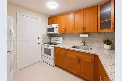 680 Miller Dr #W405, Miami Springs, FL 33166 - Photo 7