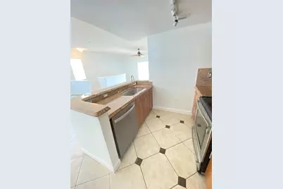 5880 W Sample Rd #308, Coral Springs, FL 33067 - Photo 17