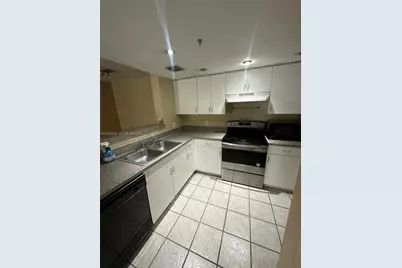 5035 Wiles Rd #203, Coconut Creek, FL 33073 - Photo 13