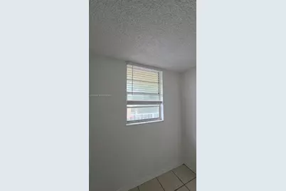 4550 NW 9th St #308E, Miami, FL 33126 - Photo 5