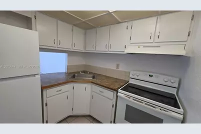 4550 NW 9th St #308E, Miami, FL 33126 - Photo 1