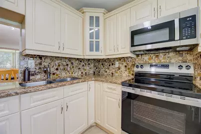 1701 NE 191st St #A103, Miami, FL 33179 - Photo 11