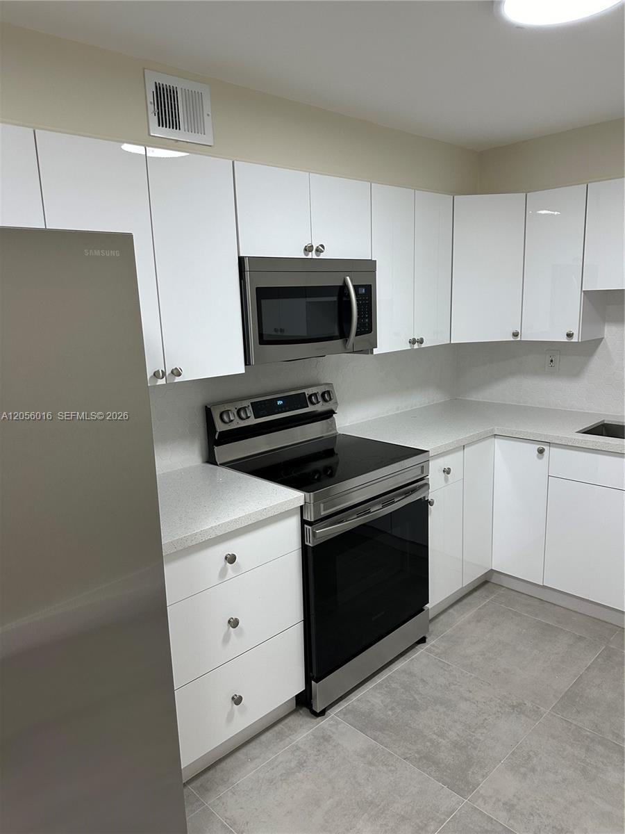 10090 NW 80th Ct #1421 - 10090 NW 80th Ct #1421, Hialeah Gardens, FL 33016 Luxury Property | Jose Angel Pina