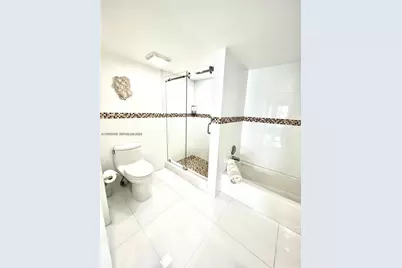 200 Golden Isles Dr #206, Hallandale Beach, FL 33009 - Photo 9