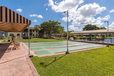 100 Ashbury Rd #107, Hollywood, FL 33024 - Photo 13