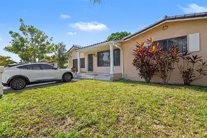 281 NE 169th St, North Miami Beach, FL 33162 - Photo 1