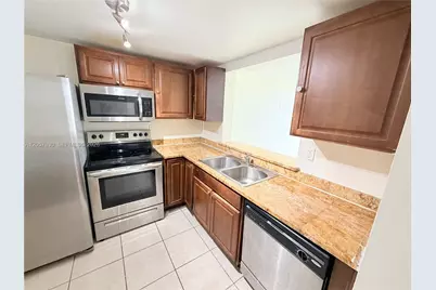 496 NW 165th St Rd #D-409, Miami, FL 33169 - Photo 5