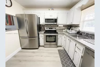 9801 Sunrise Lakes Blvd #203, Sunrise, FL 33322 - Photo 1