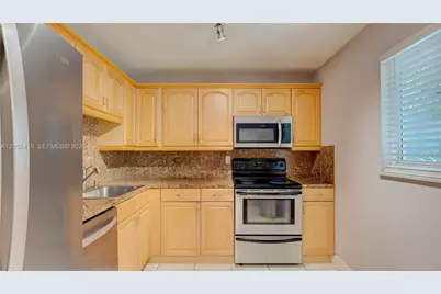 7910 Camino Real #N105, Miami, FL 33143 - Photo 11