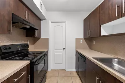 13 S Royal Poinciana Blvd #14, Miami Springs, FL 33166 - Photo 1
