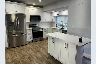 2403 NW 108th Ter, Sunrise, FL 33322 - Photo 11
