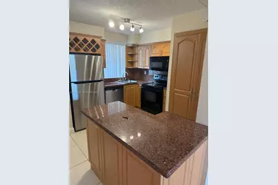 6045 NW 186th St #309, Hialeah, FL 33015 - Photo 1