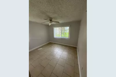 5005 Wiles Rd #102, Coconut Creek, FL 33073 - Photo 11