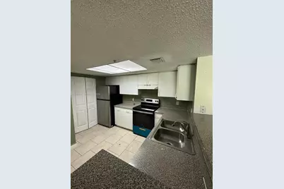 5005 Wiles Rd #102, Coconut Creek, FL 33073 - Photo 5