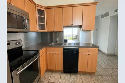 3703 NE 166th St #704, North Miami Beach, FL 33160 - Photo 11