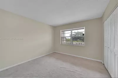 1100 NW 87th Ave #401, Coral Springs, FL 33071 - Photo 13