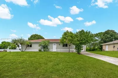 909 Sally Ave NE, Lehigh Acres, FL 33971 - Photo 1