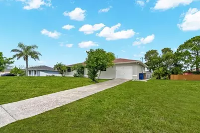 909 Sally Ave NE, Lehigh Acres, FL 33971 - Photo 7