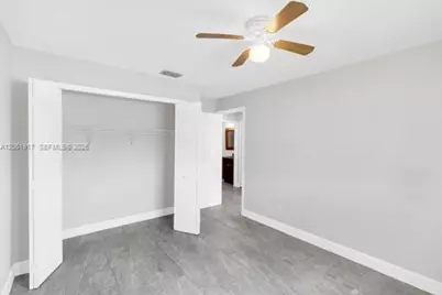 909 Sally Ave NE, Lehigh Acres, FL 33971 - Photo 39
