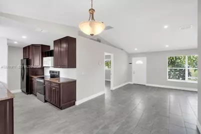 909 Sally Ave NE, Lehigh Acres, FL 33971 - Photo 21