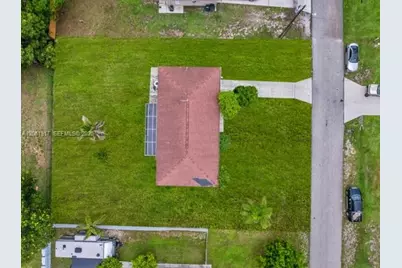 909 Sally Ave NE, Lehigh Acres, FL 33971 - Photo 11