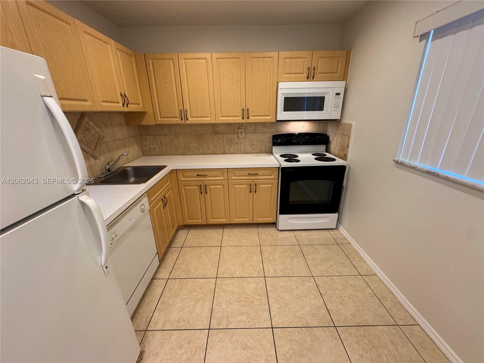 7700 Camino Real #D-407 - 7700 Camino Real #D-407, Miami, FL 33143 Luxury Property | Jose Angel Pina
