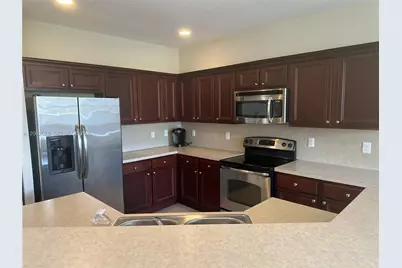 1015 NE 208th St, Miami, FL 33179 - Photo 1