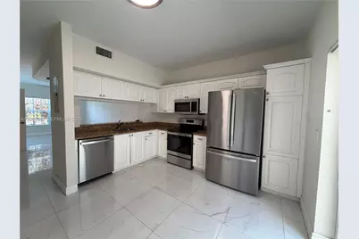 9820 NW 56th Pl #0, Coral Springs, FL 33076 - Photo 3