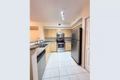 7940 N Nob Hill Rd #204, Tamarac, FL 33321 - Photo 1