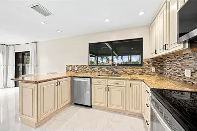 3931 NW 7th Pl, Deerfield Beach, FL 33442 - Photo 5