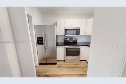 2084 NE 167th St #2-102, North Miami Beach, FL 33162 - Photo 1