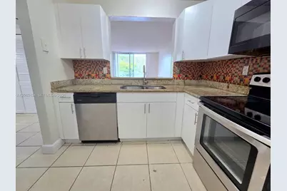482 NW 165th St Rd #A306, Miami, FL 33169 - Photo 1